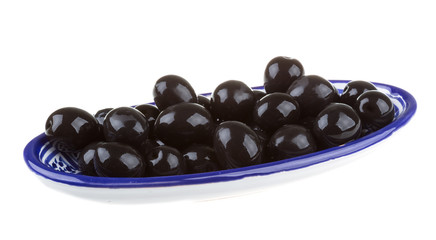 Olives black watered with olive oil in a bowl isolated on a whit