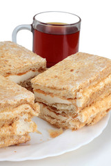 Sweet cookie and glass tea cup