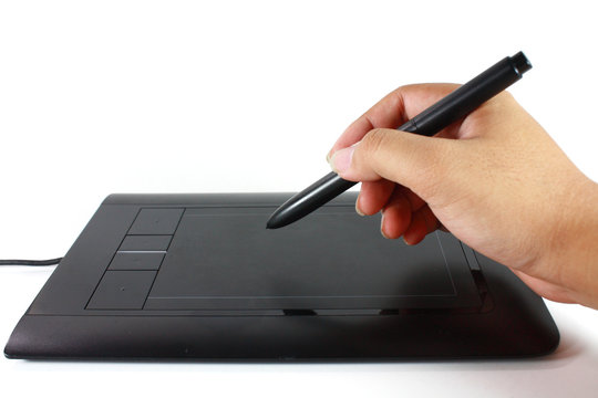 hand using computer tablet