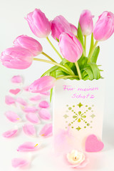 Überraschung mit rosa Tulpen