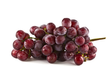 Fototapeta premium Close up of red grapes on white background with copy space.