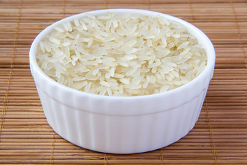 White rice in white ceramic cup