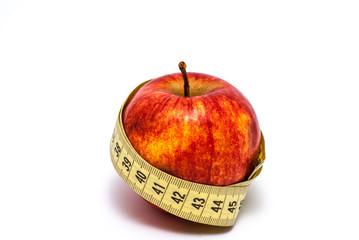 Jabłko i metr krawiecki