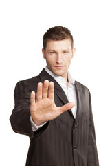 Business Man With Stop Hand Up On White Background
