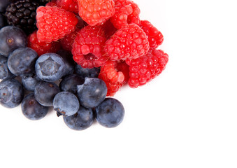 Red fruits closeup, isolated on white background.