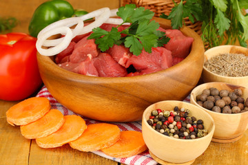 Raw beef meat marinated with herbs and spices