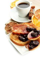 White bread toast with jam and cup of coffee, isolated on white