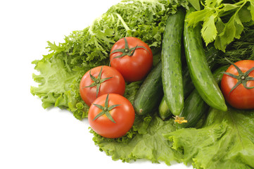 Stacked of Green cucumber with red tomato green lettuce