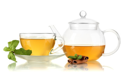 Cup of tea with mint and cinnamon isolated on white