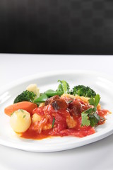 fried fish with tomato sauce