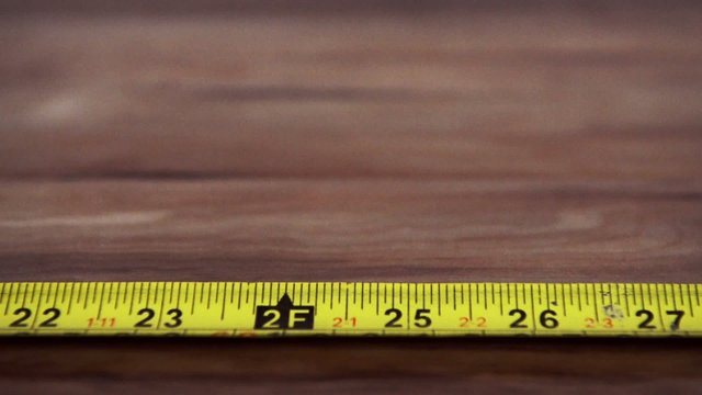 wood floor and measuring tape