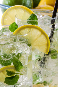 Closeup of cold lemon drink with mint