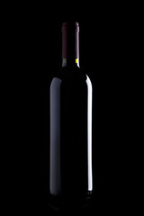elegant bottle of red wine on black background