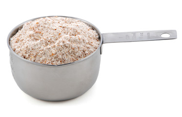 Wholemeal flour presented in a cup measure