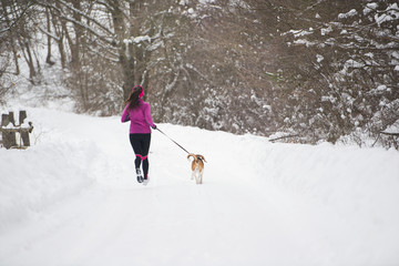 Woman running in winter