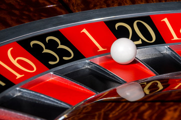 Classic casino roulette wheel with red sector one 1