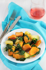 pumpkin, potato and spinach on the plate