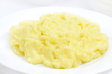 Mashed potatoes on a white plate