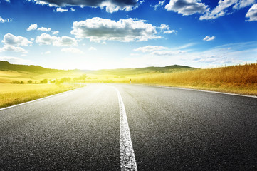 asphalt road in Tuscany, Italy