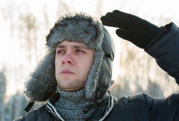 man in a fur winter hat