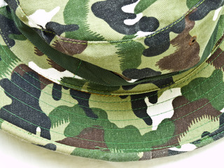 Close-up of camouflage hat isolated on white background