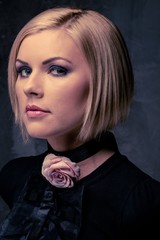 Beautiful woman with rosebud