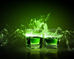 Two glasses of green absinth