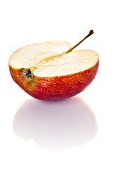 Half an apple on a white background