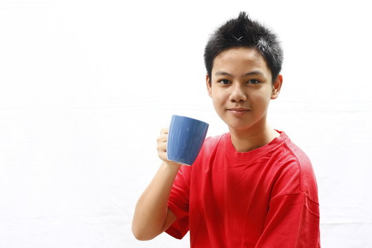 Boy Teenager Holding A Mug