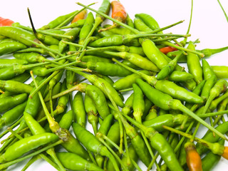 Green birds eye chillies pile from Thailand