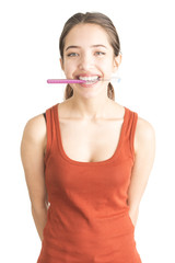 Attractive young woman holding toothbrush