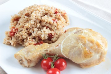 chicken with buckwheat groats and tomatoes - obrazy, fototapety, plakaty