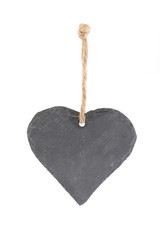 Heart shaped piece of slate on white