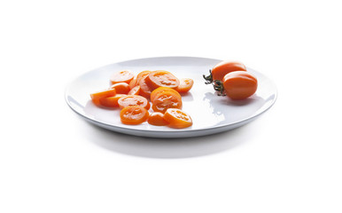 Sliced ​​tomato on a plate.