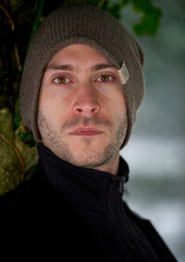 Young good looking male outdoors in snow