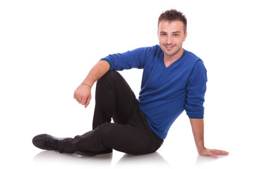 Fototapeta premium casual man sitting on the floor
