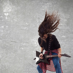 headbanging electric guitar player