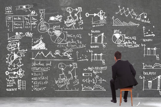 business man looking at some calculations