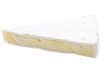 A piece of soft brie cheese