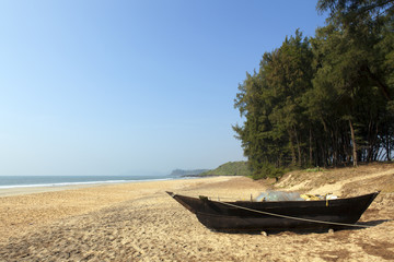 Fototapeta na wymiar Boat on Galgibaga Beach, South Goa.