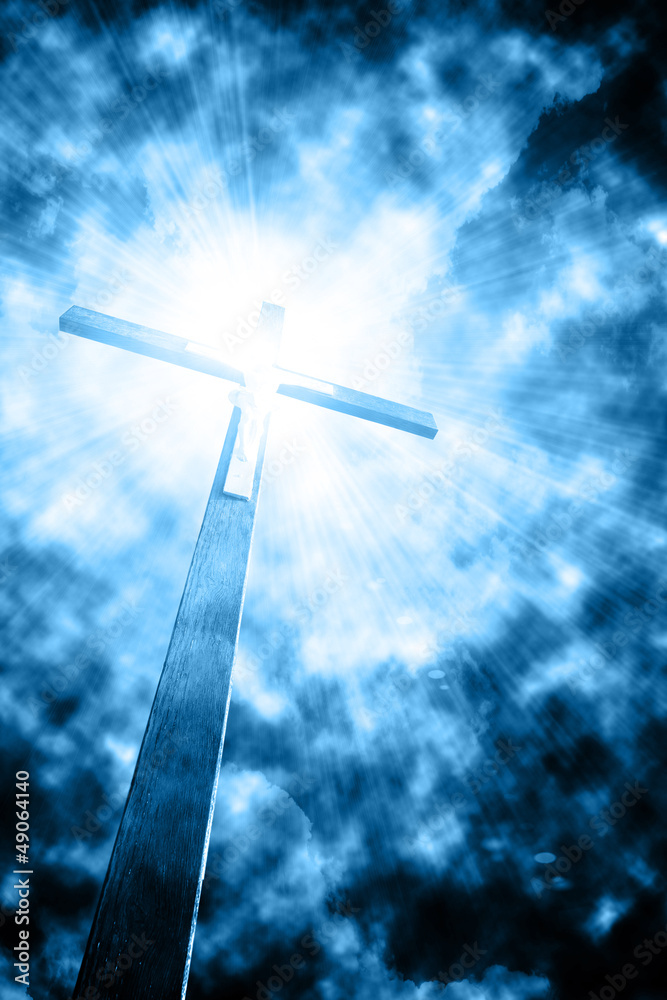 Poster cross in sunrays against cloudy sky - Posters
