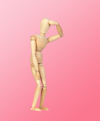 Jointed wooden mannequin representing discouragement