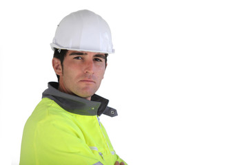 Construction worker wearing reflective jacket