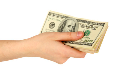 Stack of one hundred dollars banknotes in hand close-up