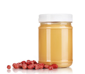 Delicious peanut butter in jar of peanut near isolated on white