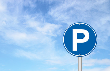 parking sign with a blue sky