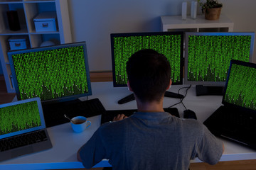 Hacker sitting streaming data