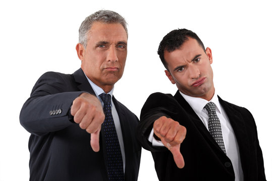 businessmen, thumbs down