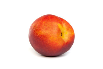 Three fresh nectarines on white
