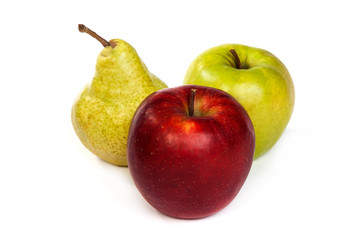 A pear and a red apple and a green apple isolated on white